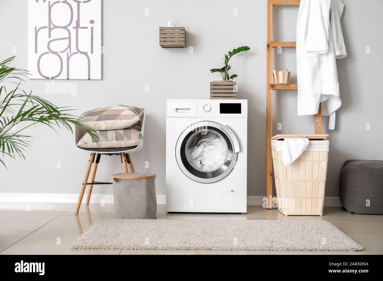 Interior of home laundry room with modern washing machine Stock Photo ...