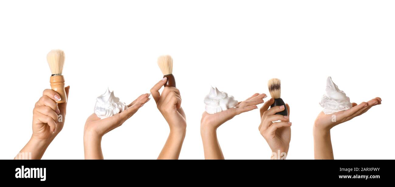 Hands with shaving brushes and foam on white background Stock Photo Alamy