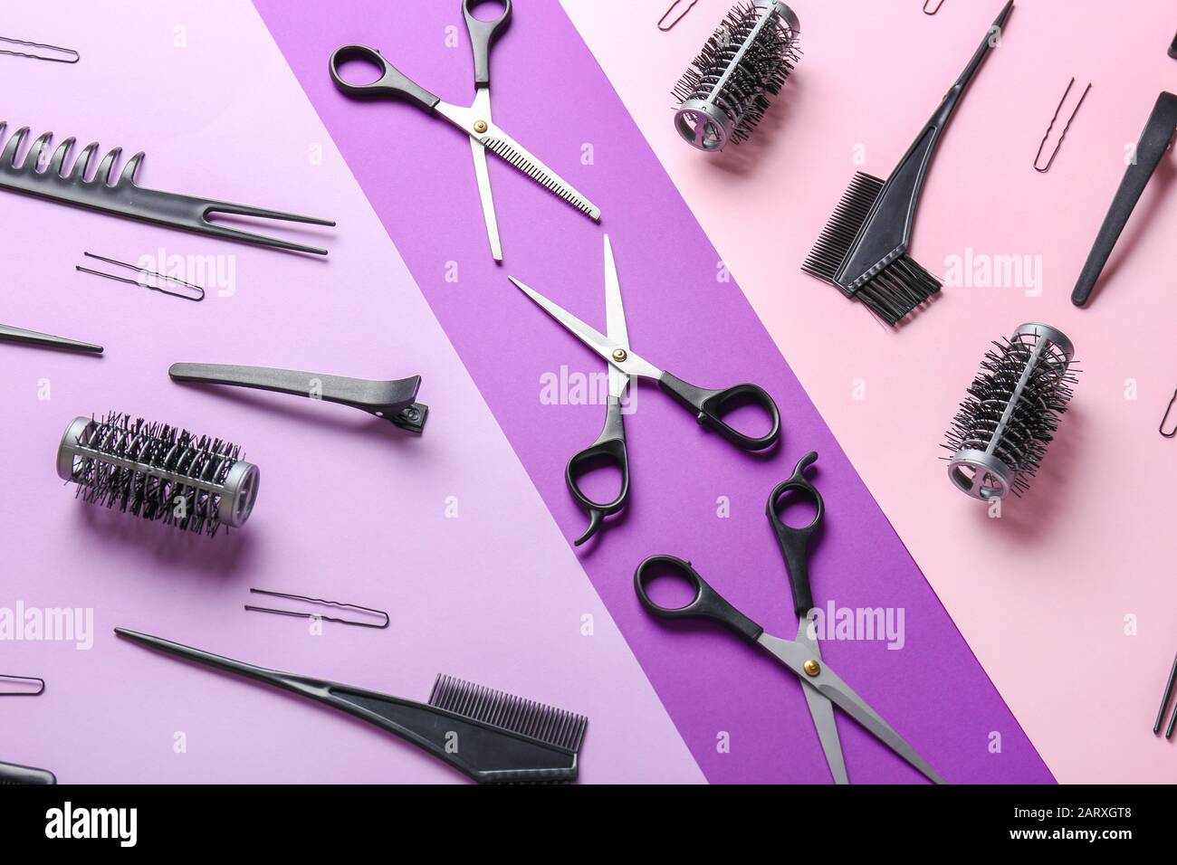 Set Of Hairdresser Tools On Color Background Stock Photo