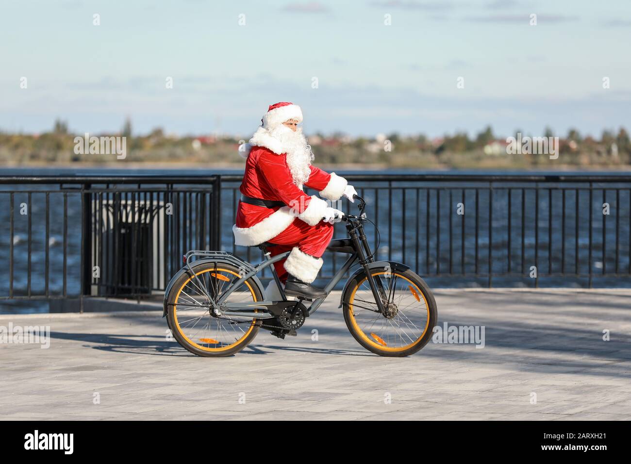 Santa Riding A Cycle Quick happy santa claus hi-res stock photography and images - Alamy