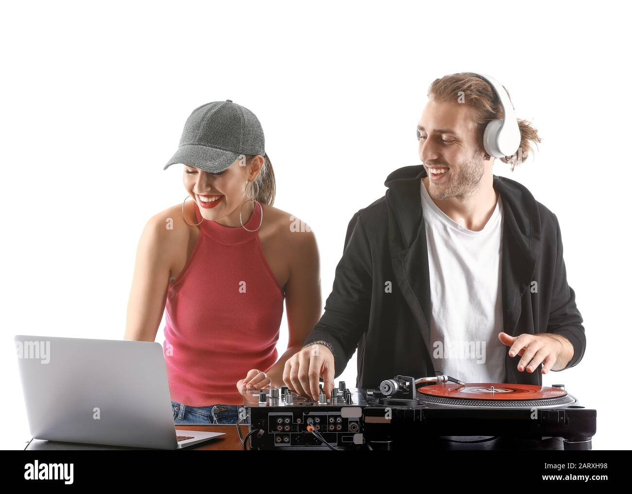 Young djs playing music on white background Stock Photo Alamy