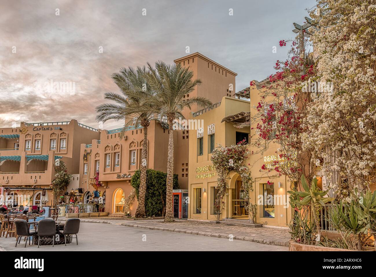 a colorful arabic restaurant in the evening sun on the pavement of the Abu Tig marina in el Gouna, Egypt, January 14, 2020 Stock Photo