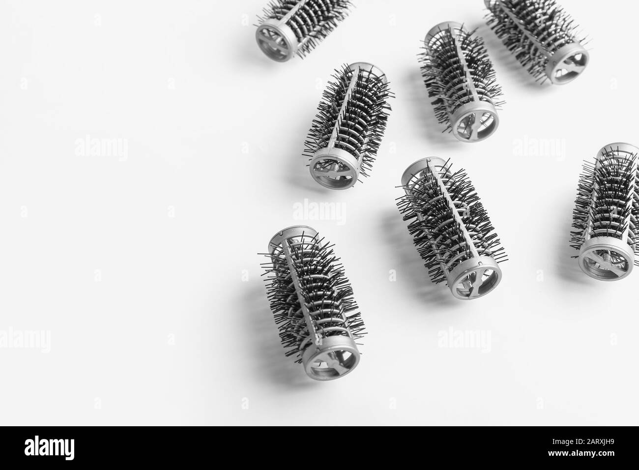 Hair curlers on white background Stock Photo