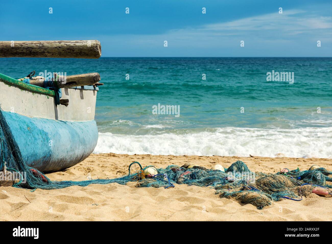 Fishing gear and boat on beach hi-res stock photography and images - Alamy
