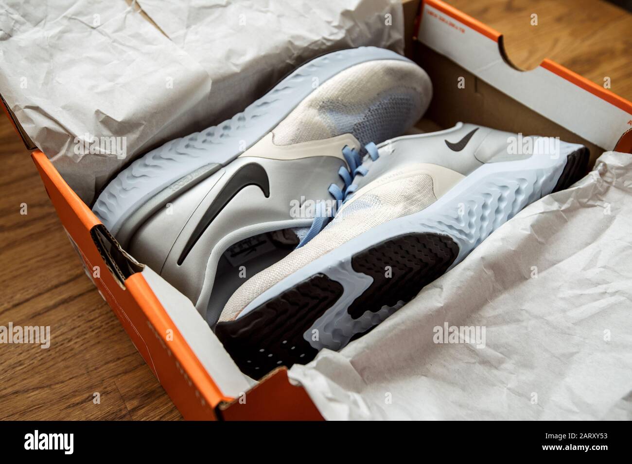 Paris, France - Sep 23, 2019: Black friday sale gift on wooden table pair  of new Nike female running professional shoes Nike Odyssey Reakt 2 Flyknit  PRM Stock Photo - Alamy