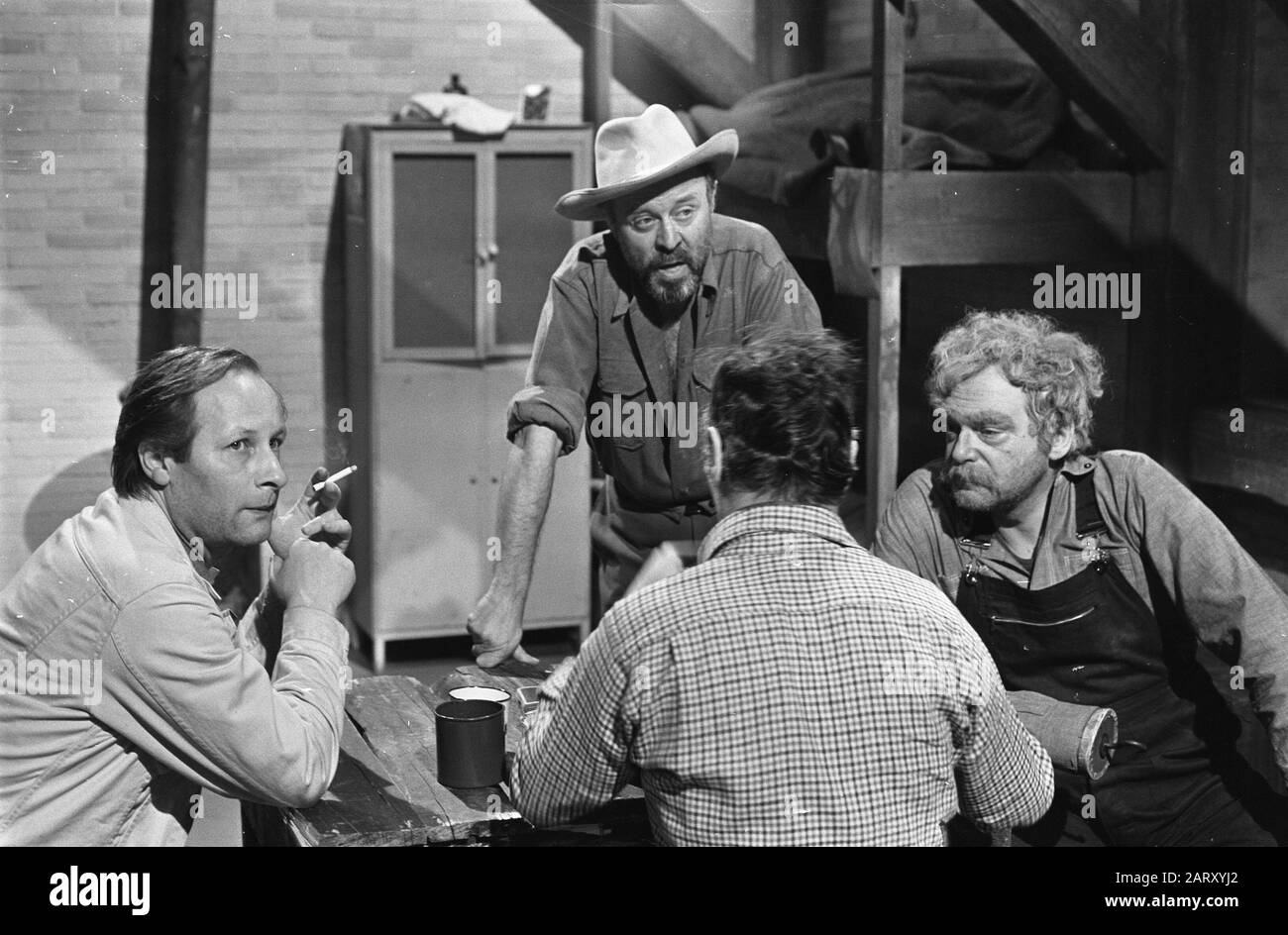 TV recordings of People and mice by John Steinbeck. From l.n.r. Cor van Rijn, Robert Sobel, Maxim Hamel (seen on the back) and Jan Blaaser Annotation: English title Of mice and men Date: 28 January 1969 Keywords: actors, television dramas Personal name: Blaaser, Jan, Hamel, Maxim, Rijn, Cor van, Sobels, Robert Stock Photo