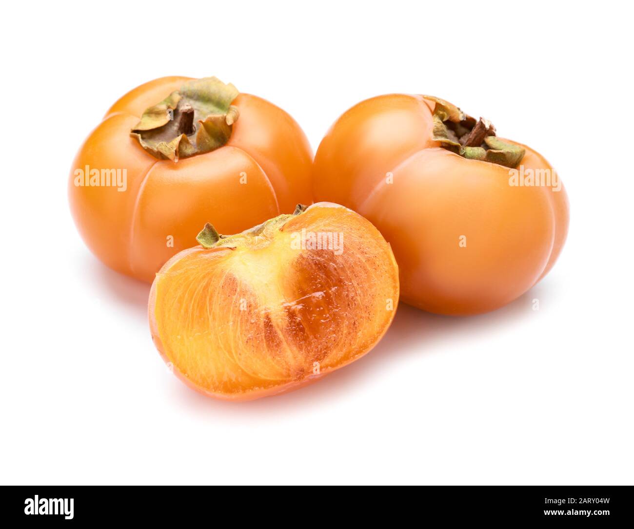 Ripe persimmons isolated on white Stock Photo - Alamy