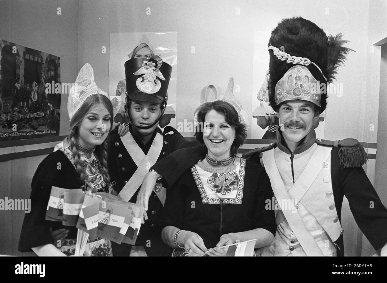 Marine Chapel at the Royal Tournament at the Earls Court Exhibition Building  Two Dutch cheese girls with two English soldiers Date: 17 July 1975 Location: Great Britain, London Keywords: headgear, costume, military, uniforms Institution name: Marine Chapel of the Royal Navy Stock Photo