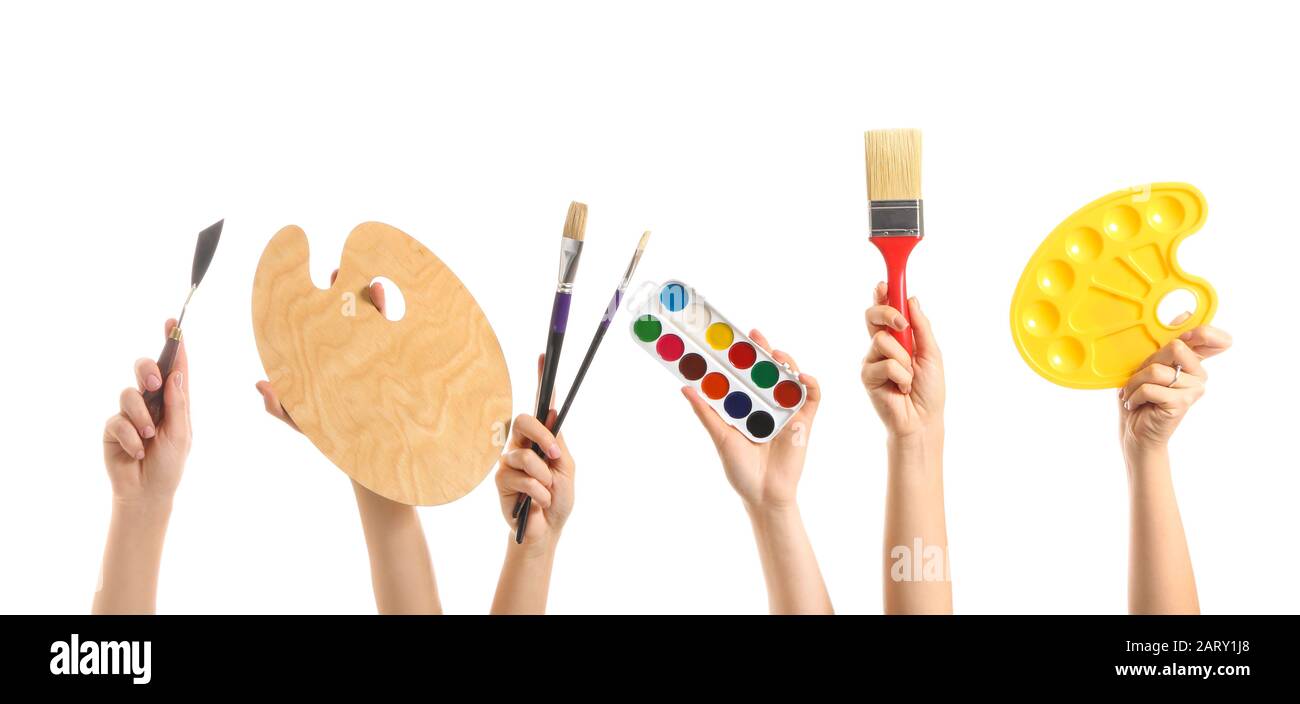 Female hands with painter's supplies on white background Stock Photo ...