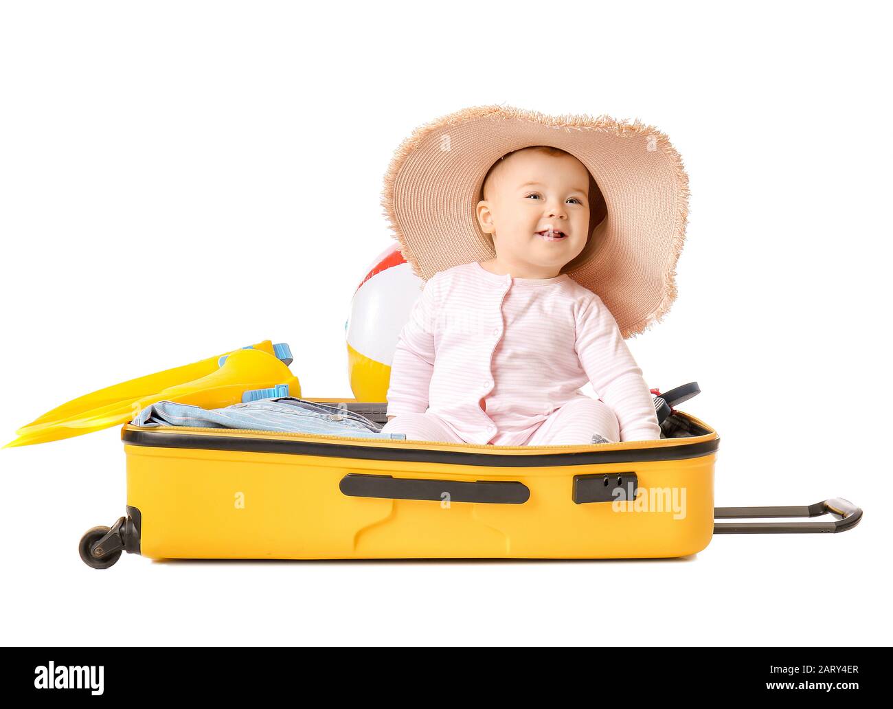 Cute baby with suitcase and belongings on white background Stock Photo