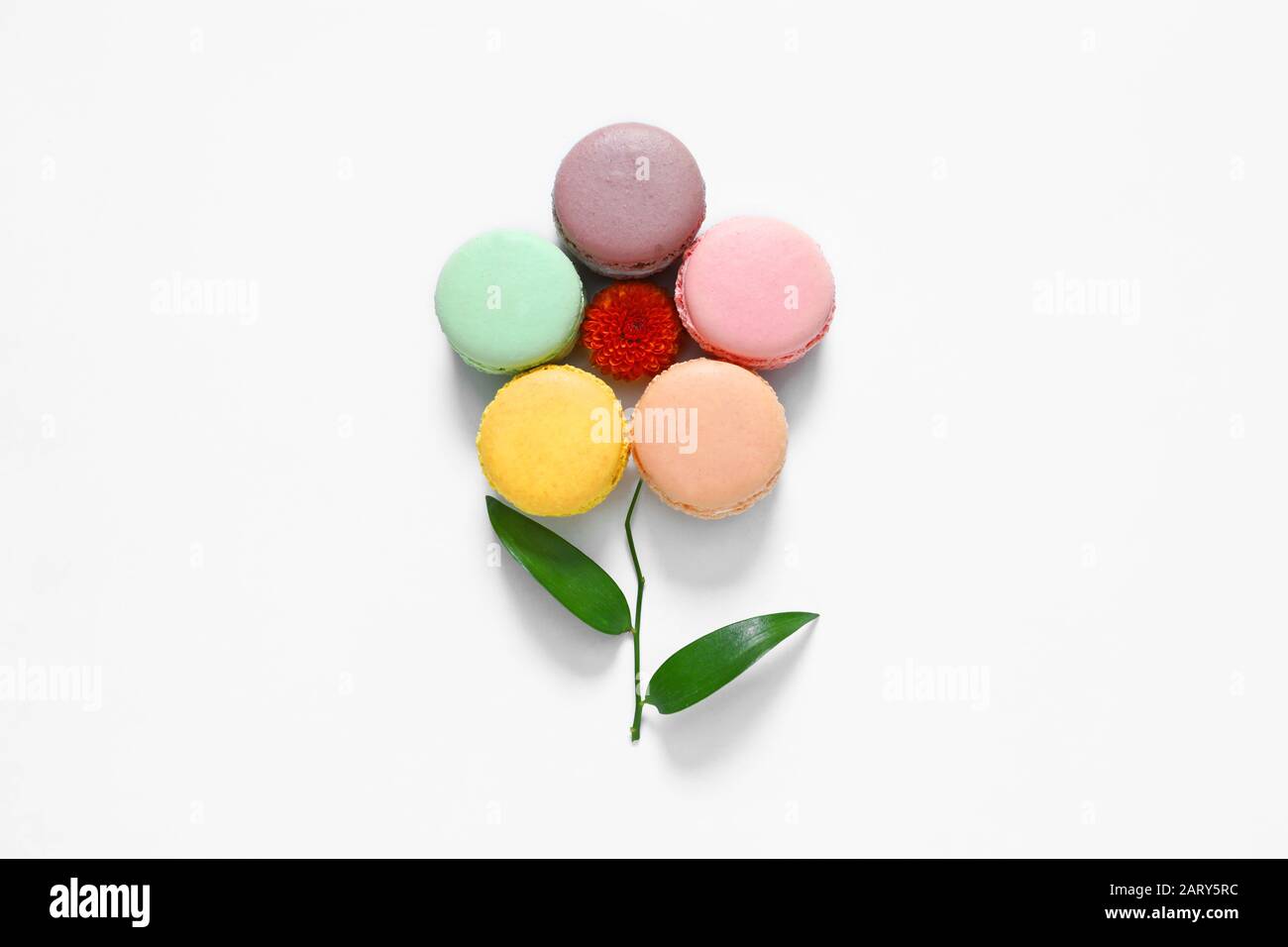 Creative composition with macarons on white background Stock Photo