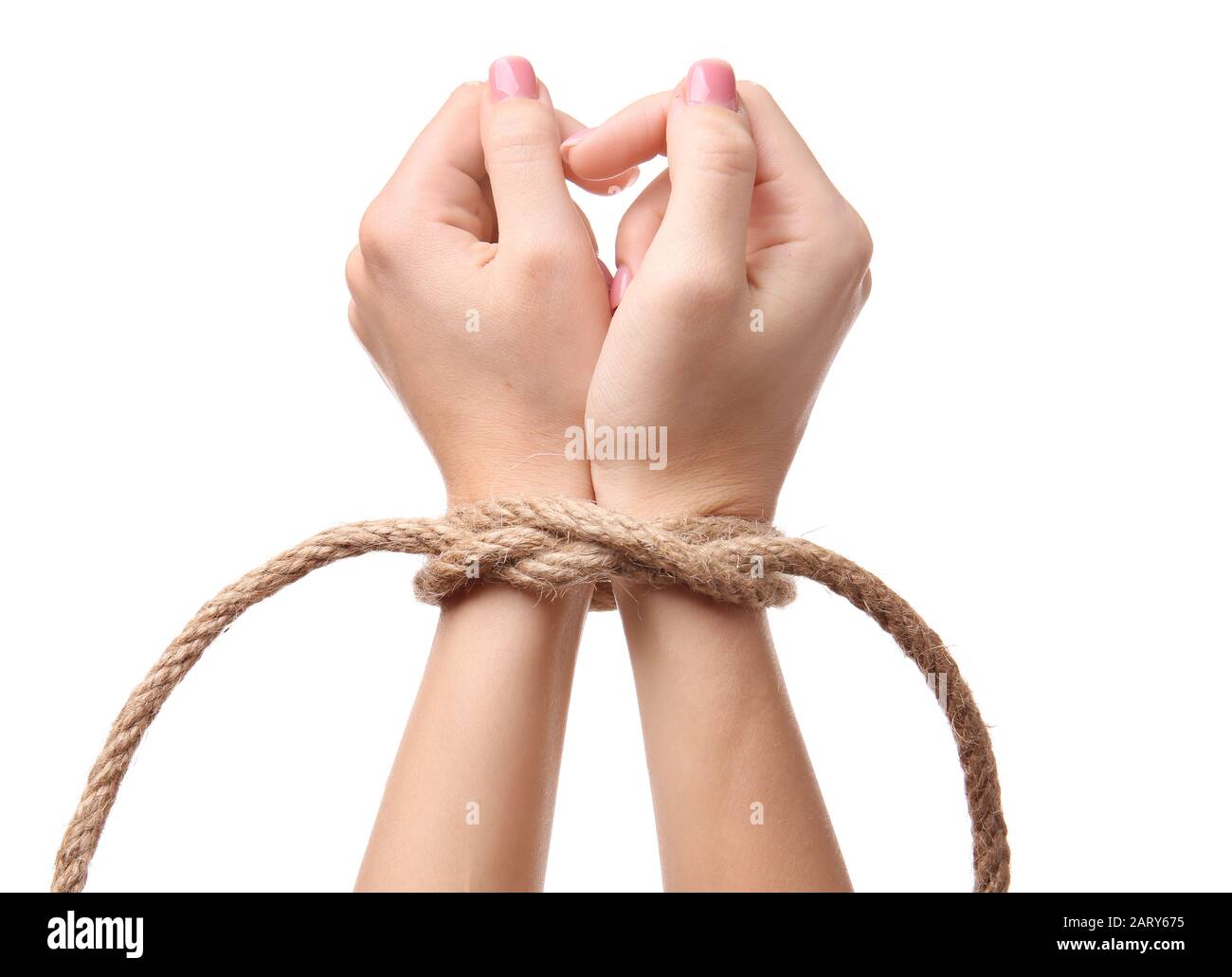 Female hands tied with rope on white background Stock Photo - Alamy