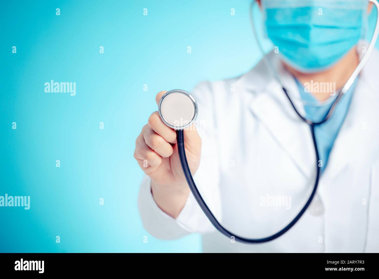 doctor with stethoscope in hand for medical exam concepts Stock Photo