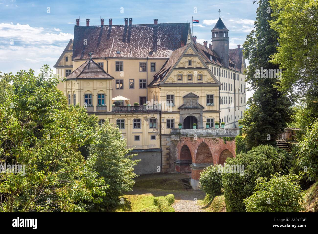 Castle of Heiligenberg in Linzgau, Germany. This Renaissance castle is a landmark of Baden-Wurttemberg. Front view of old castle in garden. Scenery of Stock Photo