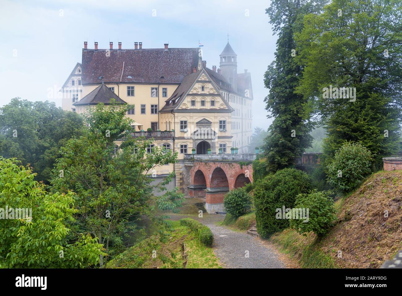 Castle of Heiligenberg in mist, Linzgau, Germany. This Renaissance castle is a landmark of Baden-Wurttemberg. Scenic view of mystery castle in foggy g Stock Photo