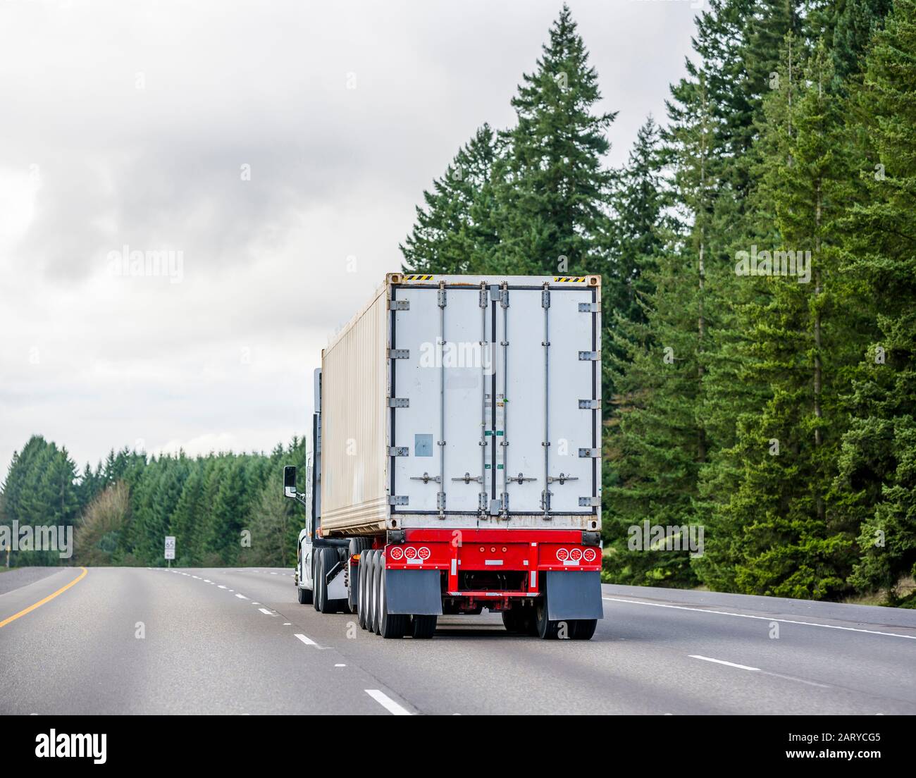 Big rig heavy-duty long haul diesel semi truck with additional axles