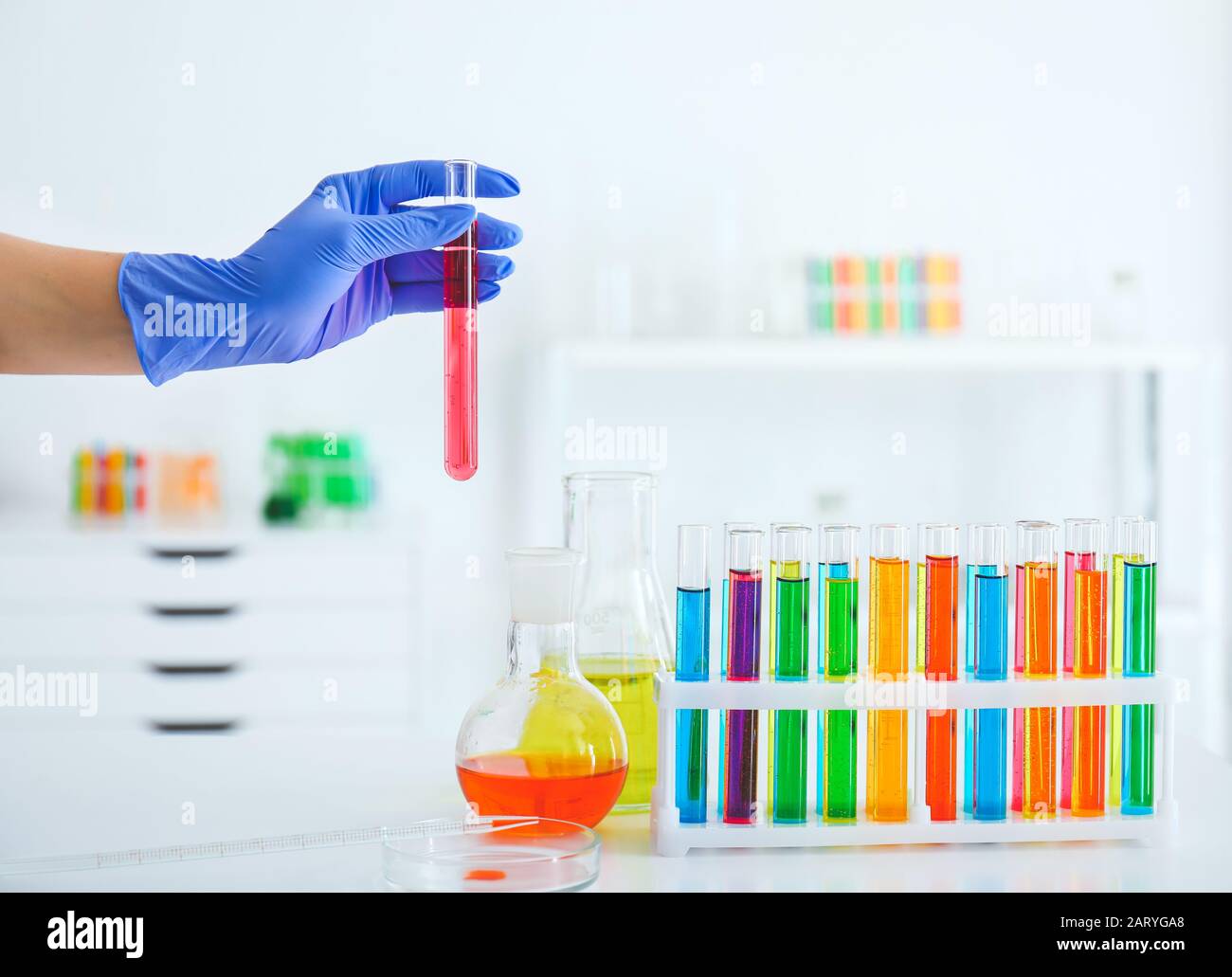 Scientist working different samples in hi-res stock photography and ...