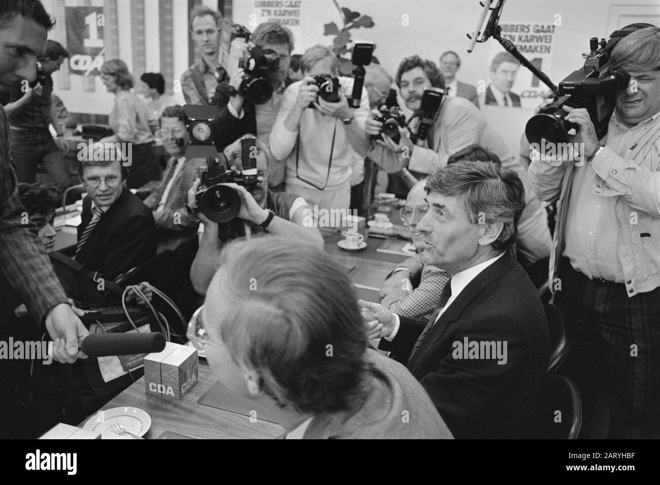 Second Chamber political meetings; premier Lubbers surrounded by the