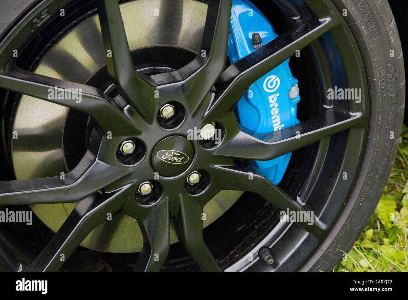 Brembo brake caliper & pads on a car Stock Photo