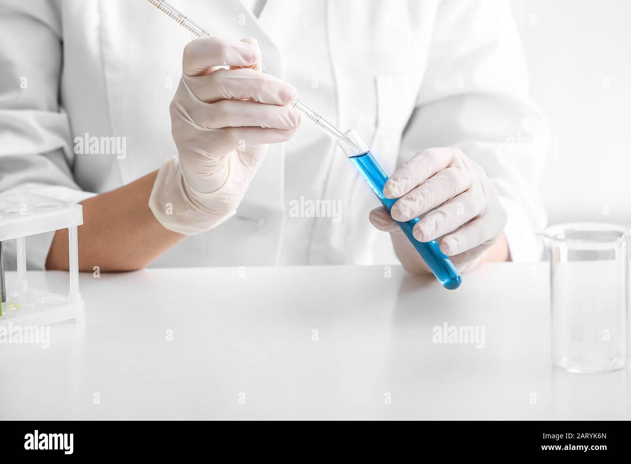 Scientist working with sample in laboratory Stock Photo Alamy