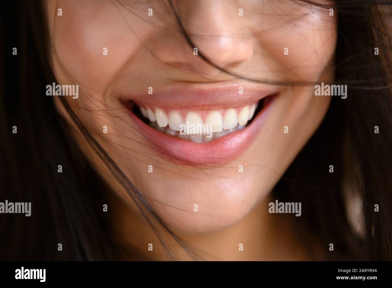 Close up of smiling woman's face Stock Photo