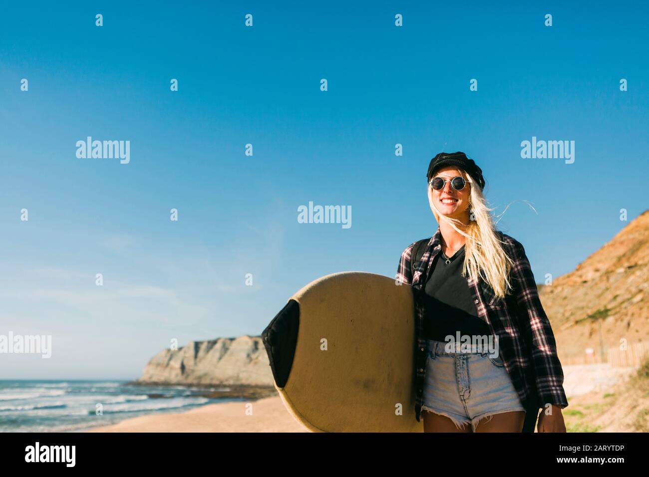 Woman smiling on hill hi-res stock photography and images - Alamy