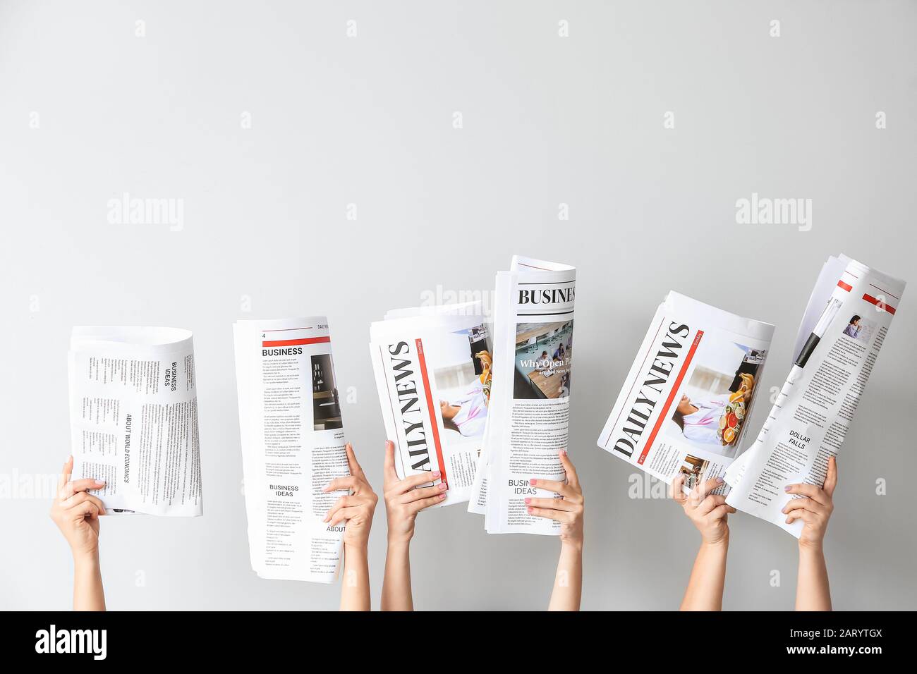 Female Hands With Newspapers On Light Background Stock Photo Alamy Female Hands With Newspapers On Light Background Stock Photo Alamy