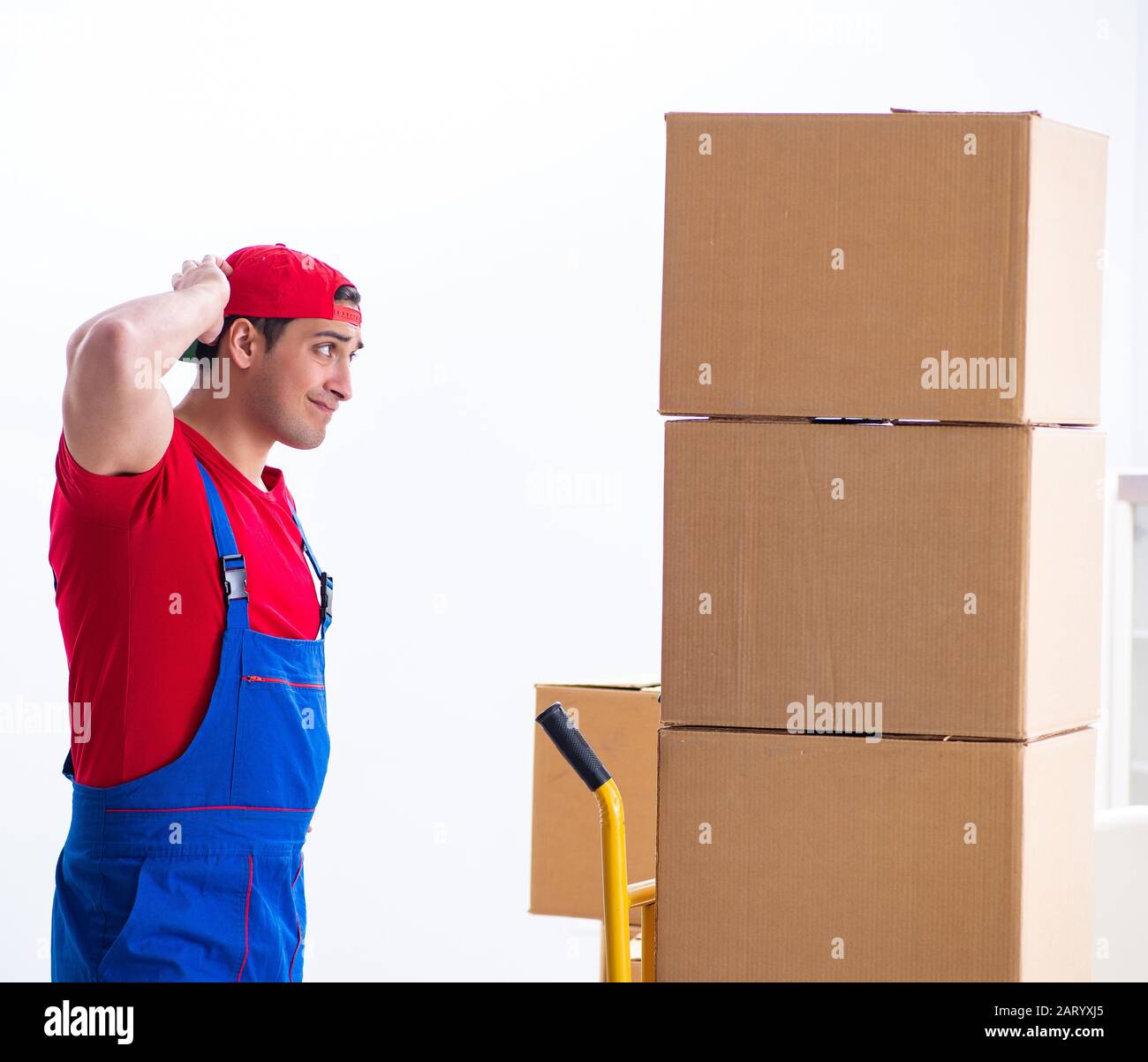 The contractor worker moving boxes during office move Stock Photo - Alamy