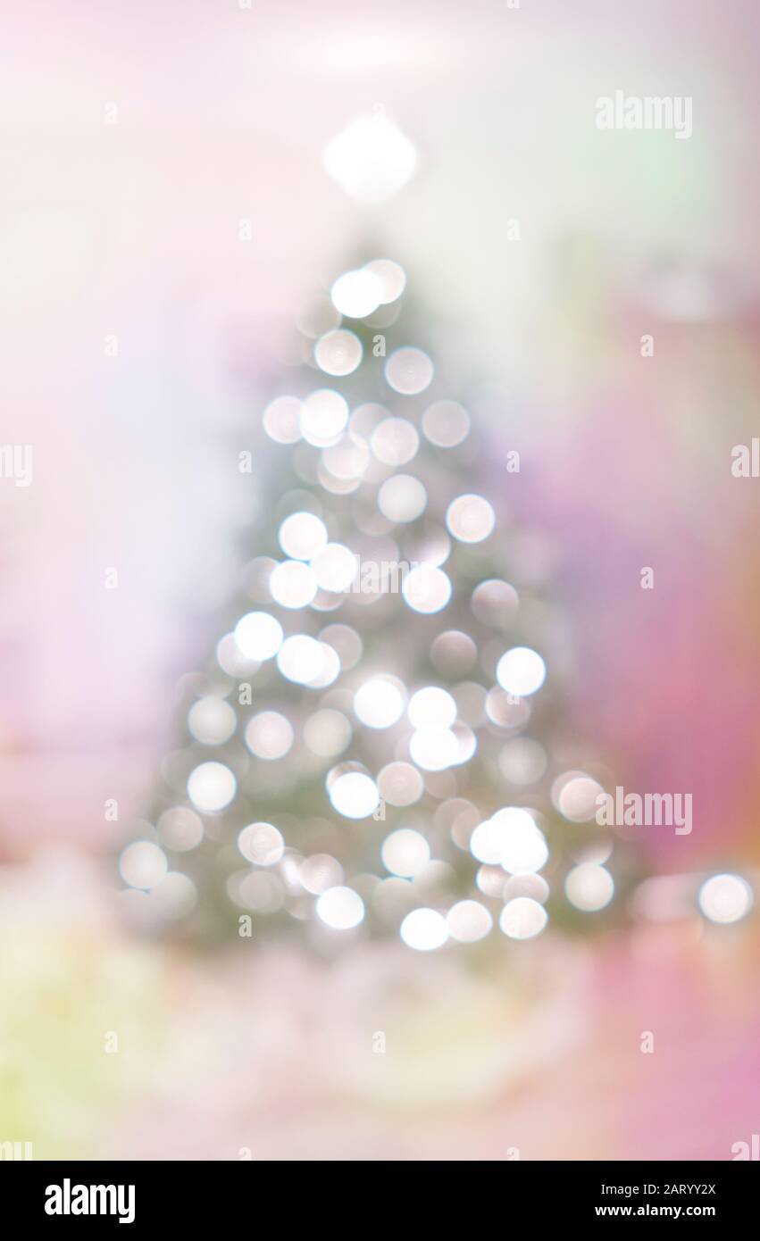 Christmas tree with lights in soft focus Stock Photo
