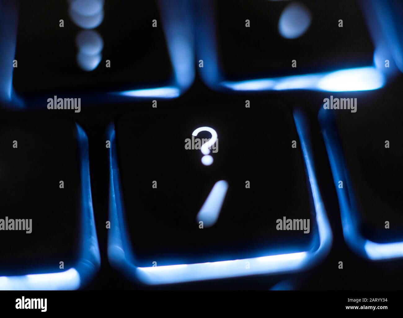 Illuminated question mark key on keyboard Stock Photo Alamy