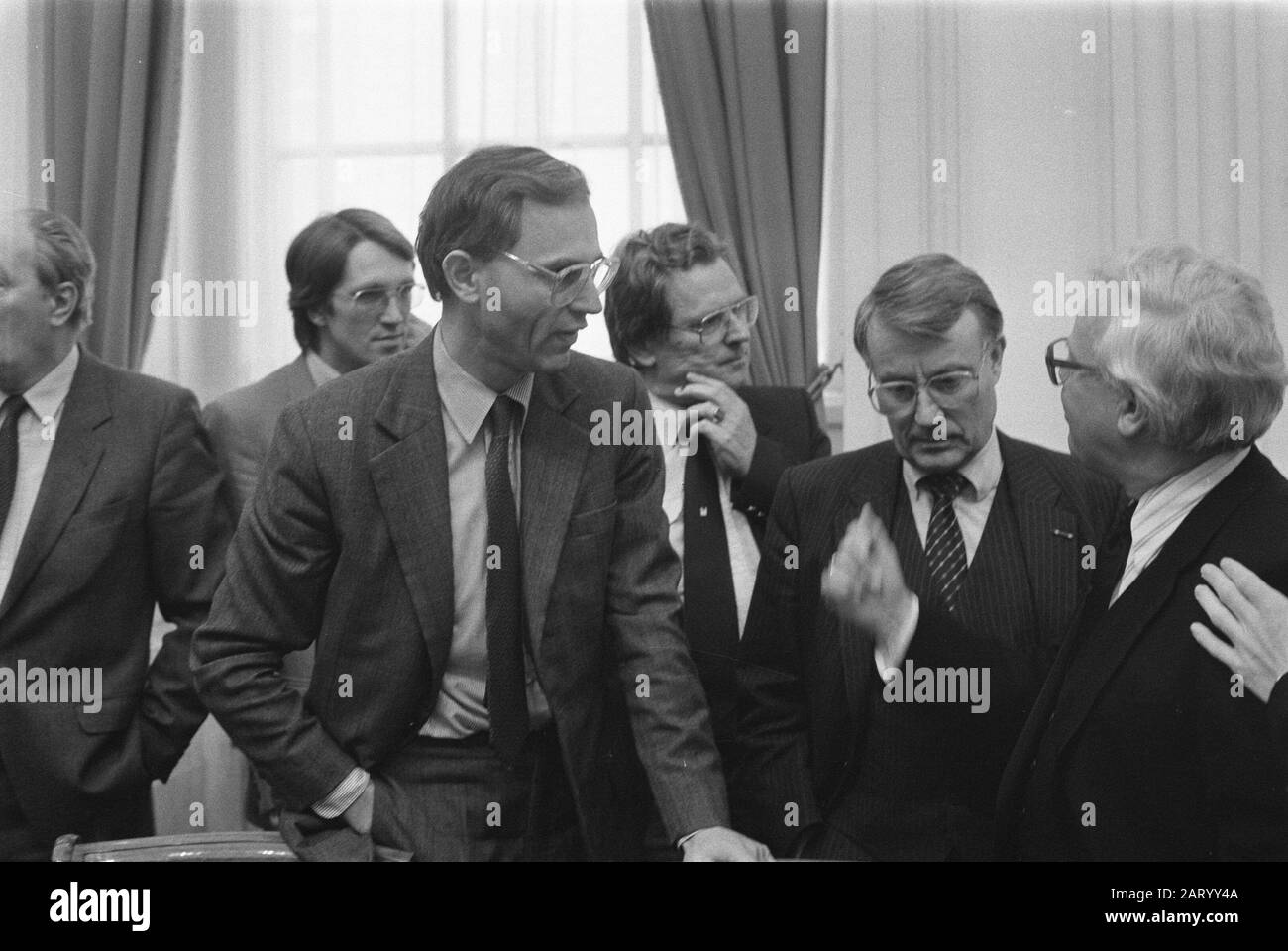 Meeting of the Chamber Committee with the Government on the report Abuse and Improper Use in the field of Taxation (ISMO), on combating fraud with social benefits  V.l.n.r. Hans Kombrink, Minister Ruding (Finance), State Secretary De Graaf, State Secretary Koning and Mr. Eversdijk Date: 30 May 1983 Location: The Hague, Zuid-Holland Keywords: taxes, fraud, ministers, parliamentarians, social security, state secretaries, meetings Personal name: Eversdijk, Huib, Graaf, Louw, Kombrink, Hans, Koning, H.E., Ruding, Onno Stock Photo