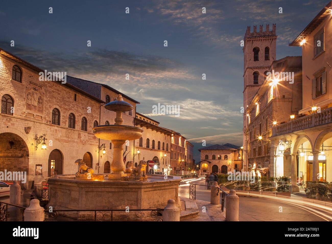 Fountain in Piazza del Comune at sunset in Assisi, Italy Stock Photo