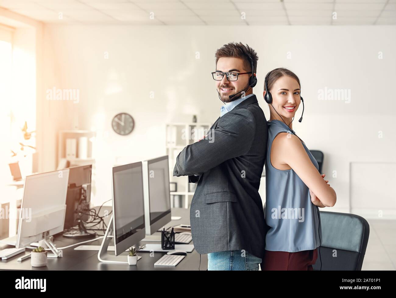 Male female call center agents hi-res stock photography and images - Alamy