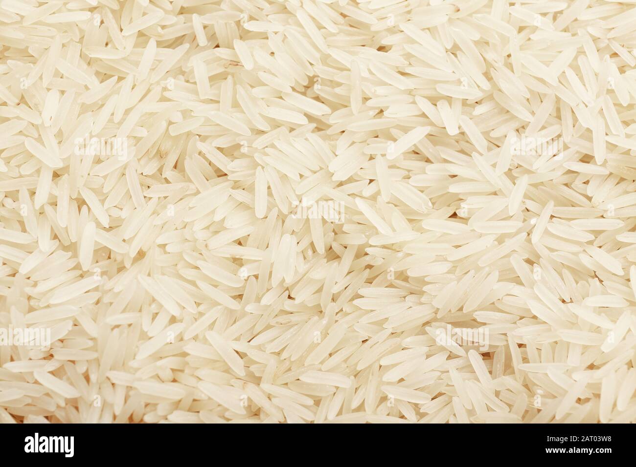 Local Rice Heap Heap of raw rice as background Stock Photo - Alamy