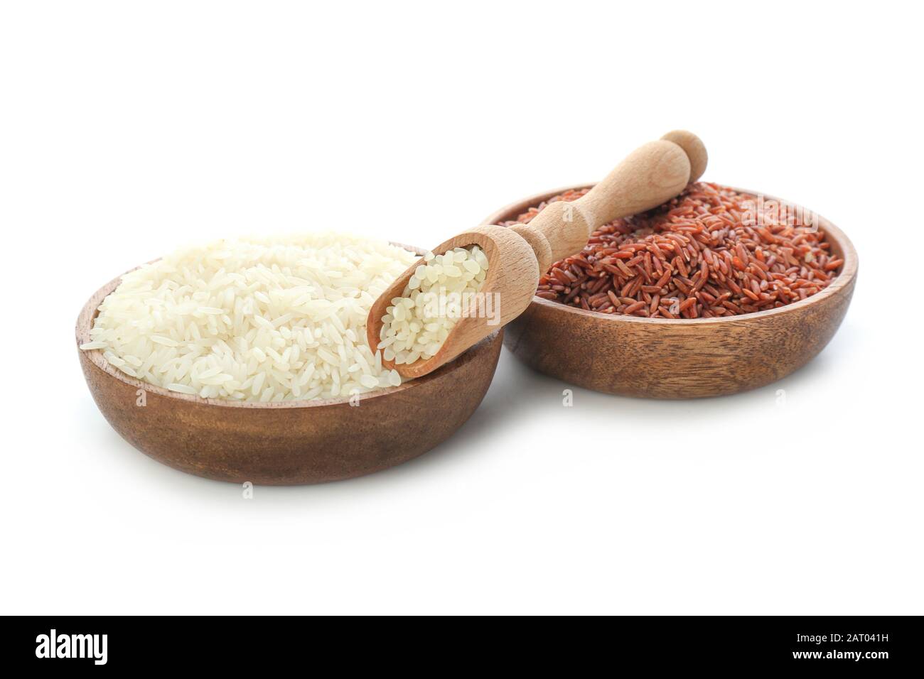 Plates with different raw rice on white background Stock Photo - Alamy