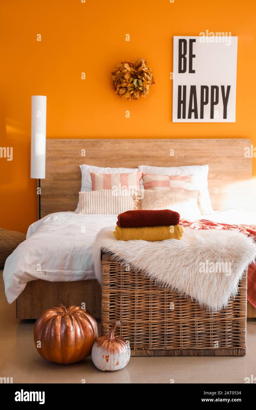 Stylish interior of modern bedroom with autumn decor Stock Photo ...