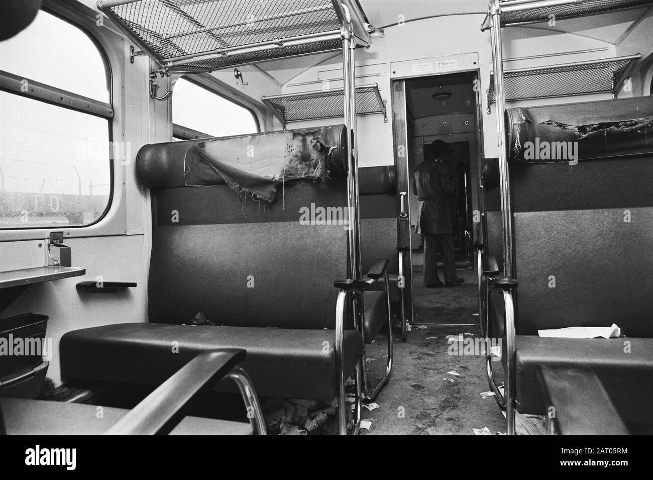 Trains destroyed by football supporters; one of the destroyed sections Date: 10 January 1977 Keywords: SUPPORTERS, sport, football Stock Photo
