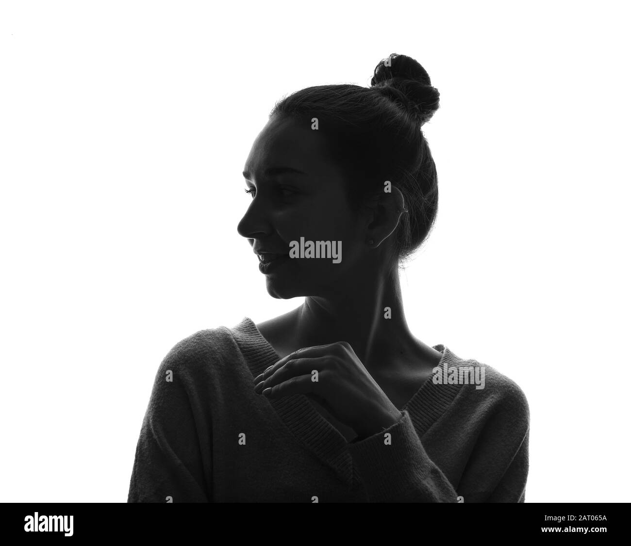Silhouette of beautiful young woman on white background Stock Photo - Alamy