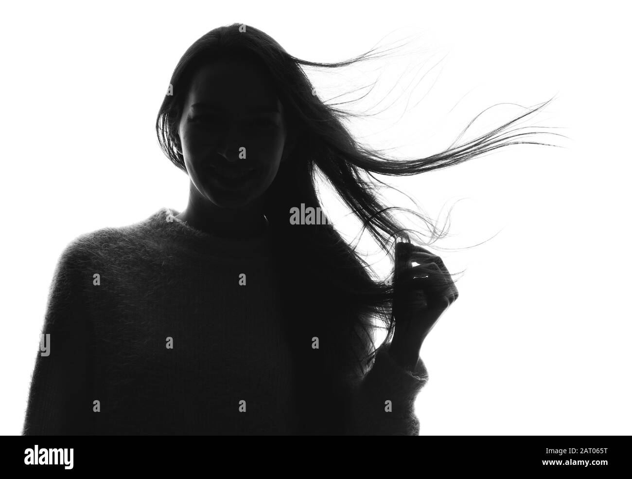 Silhouette of beautiful young woman on white background Stock Photo - Alamy
