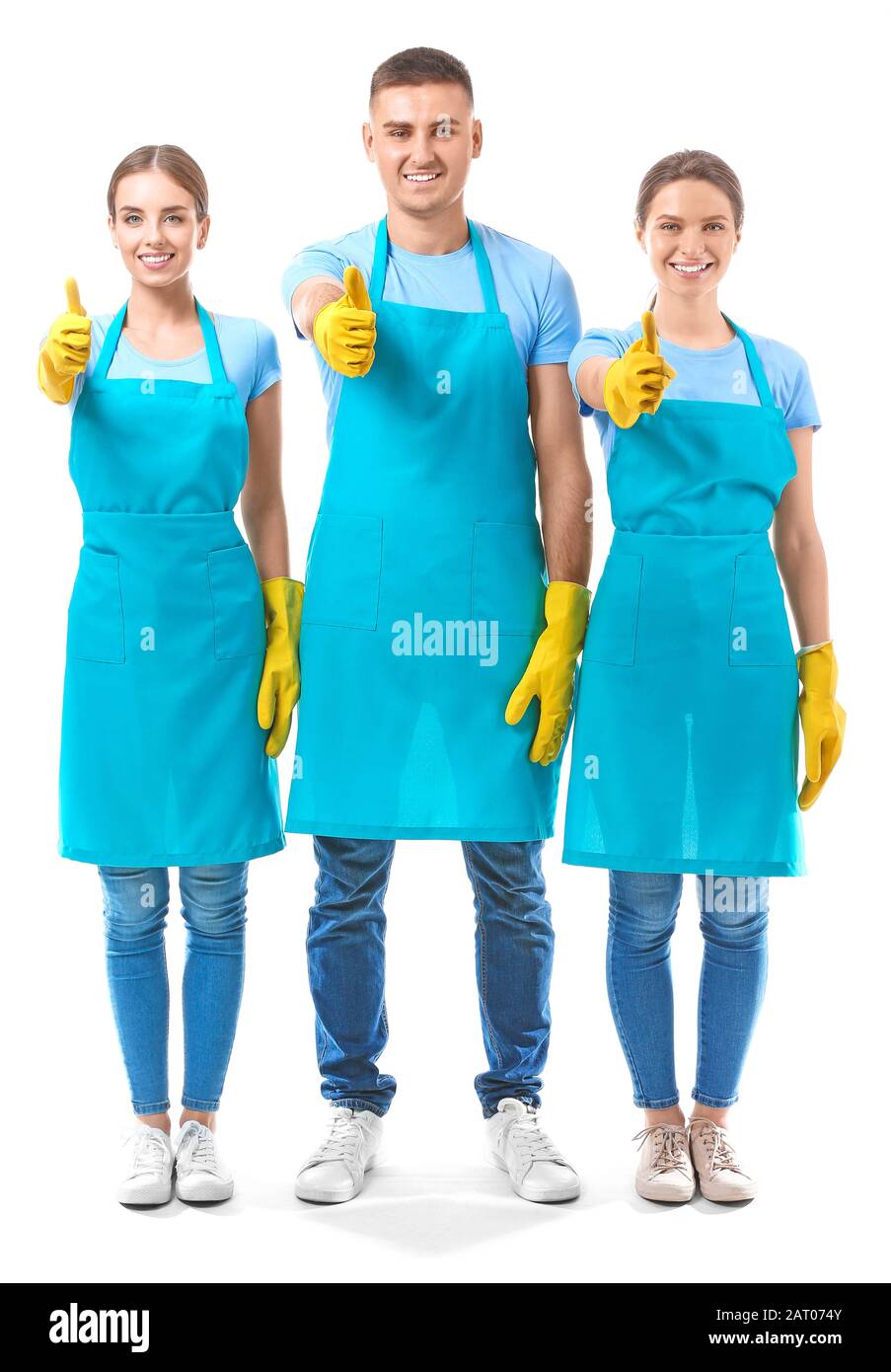 Janitors showing thumb-up on white background Stock Photo