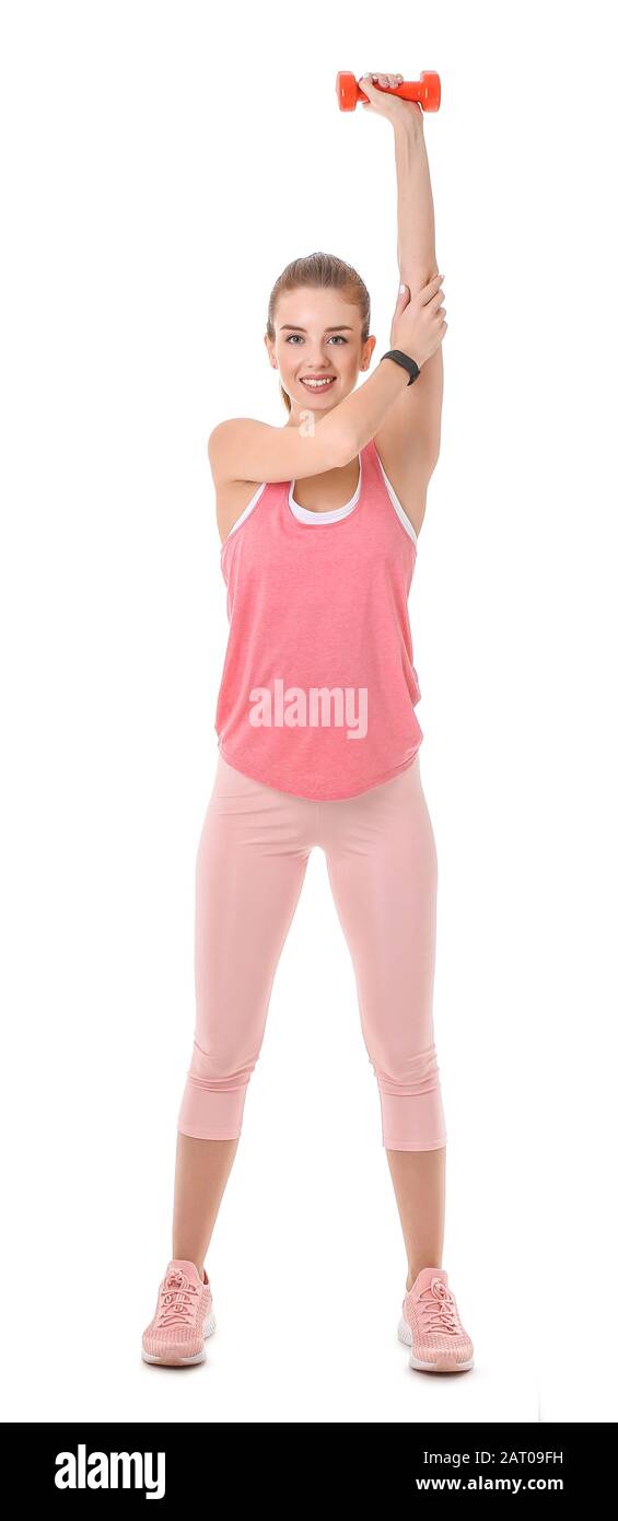 Sporty young woman training against white background Stock Photo - Alamy