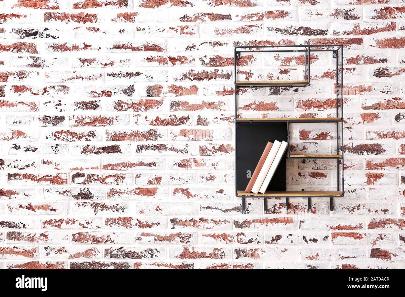 Hanging shelves on brick wall hires stock photography and images Alamy