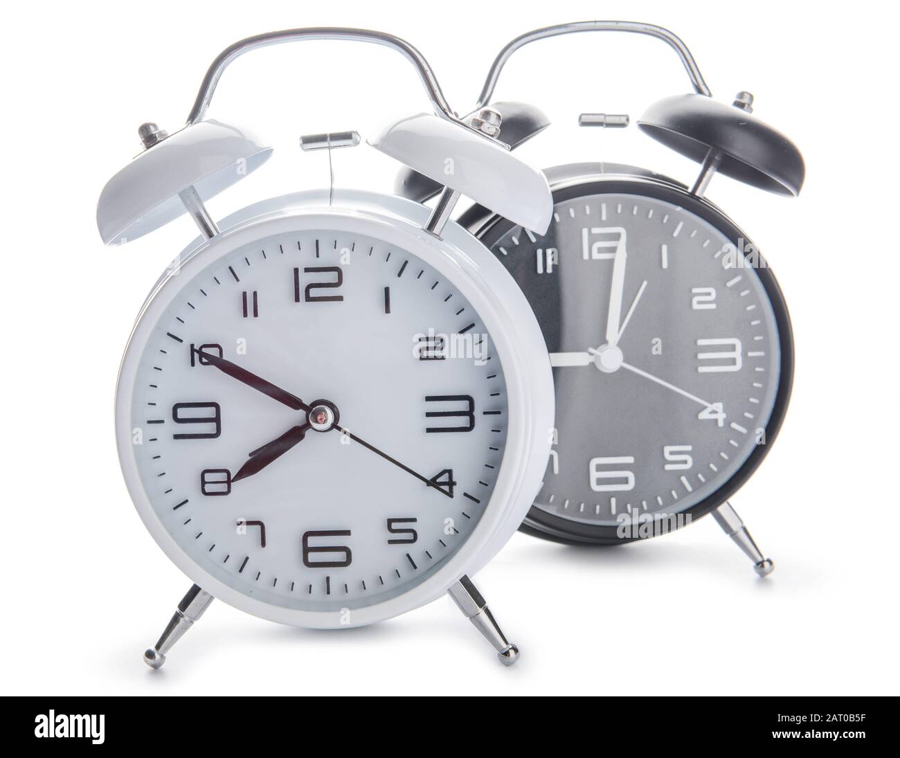 Alarm clocks on white background Stock Photo - Alamy