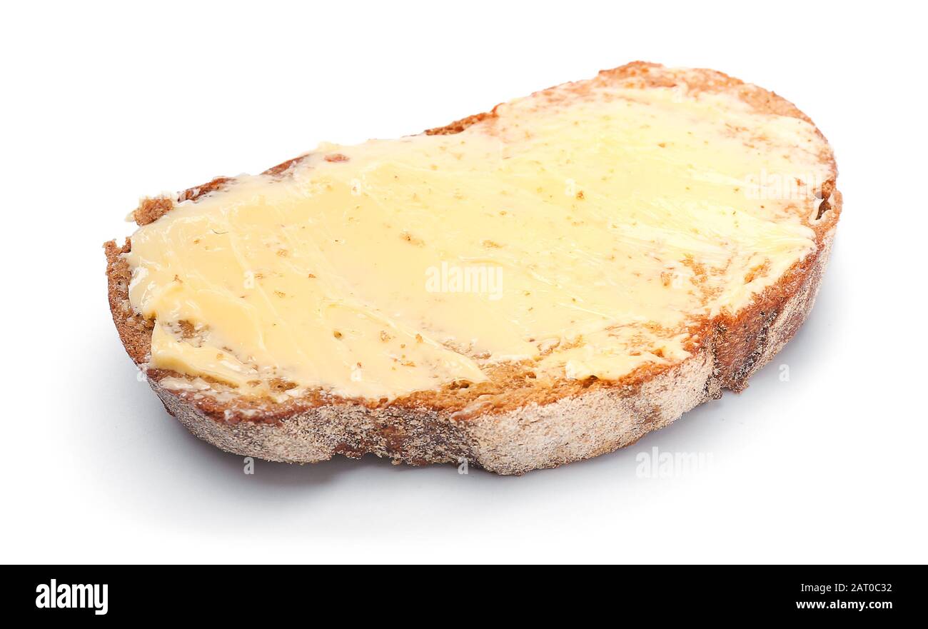 Slice of bread with butter on white background Stock Photo - Alamy