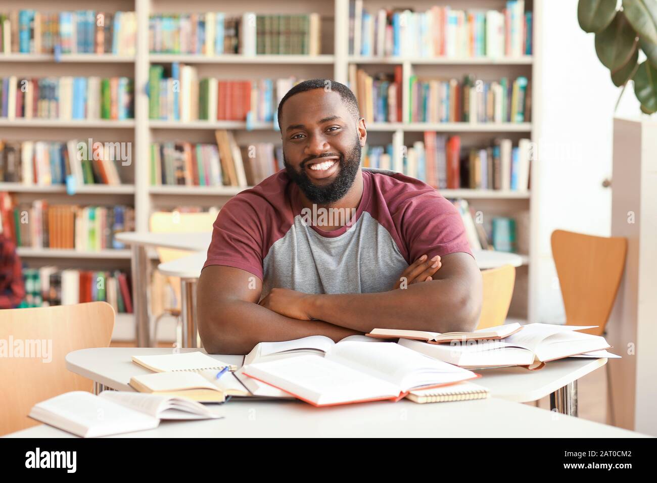 Portrait of African-American student in library Stock Photo - Alamy