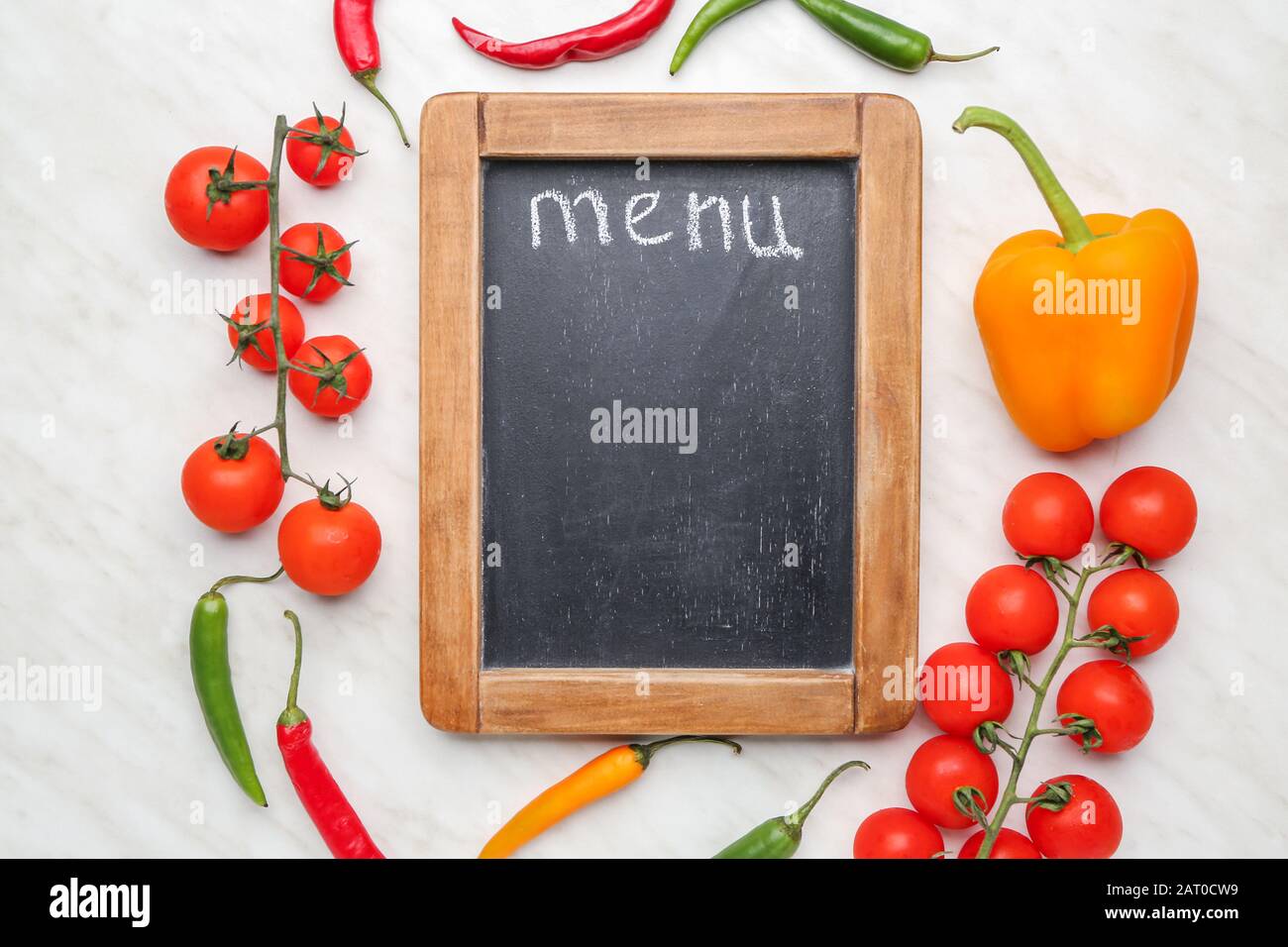 Blank menu and products on light background Stock Photo - Alamy
