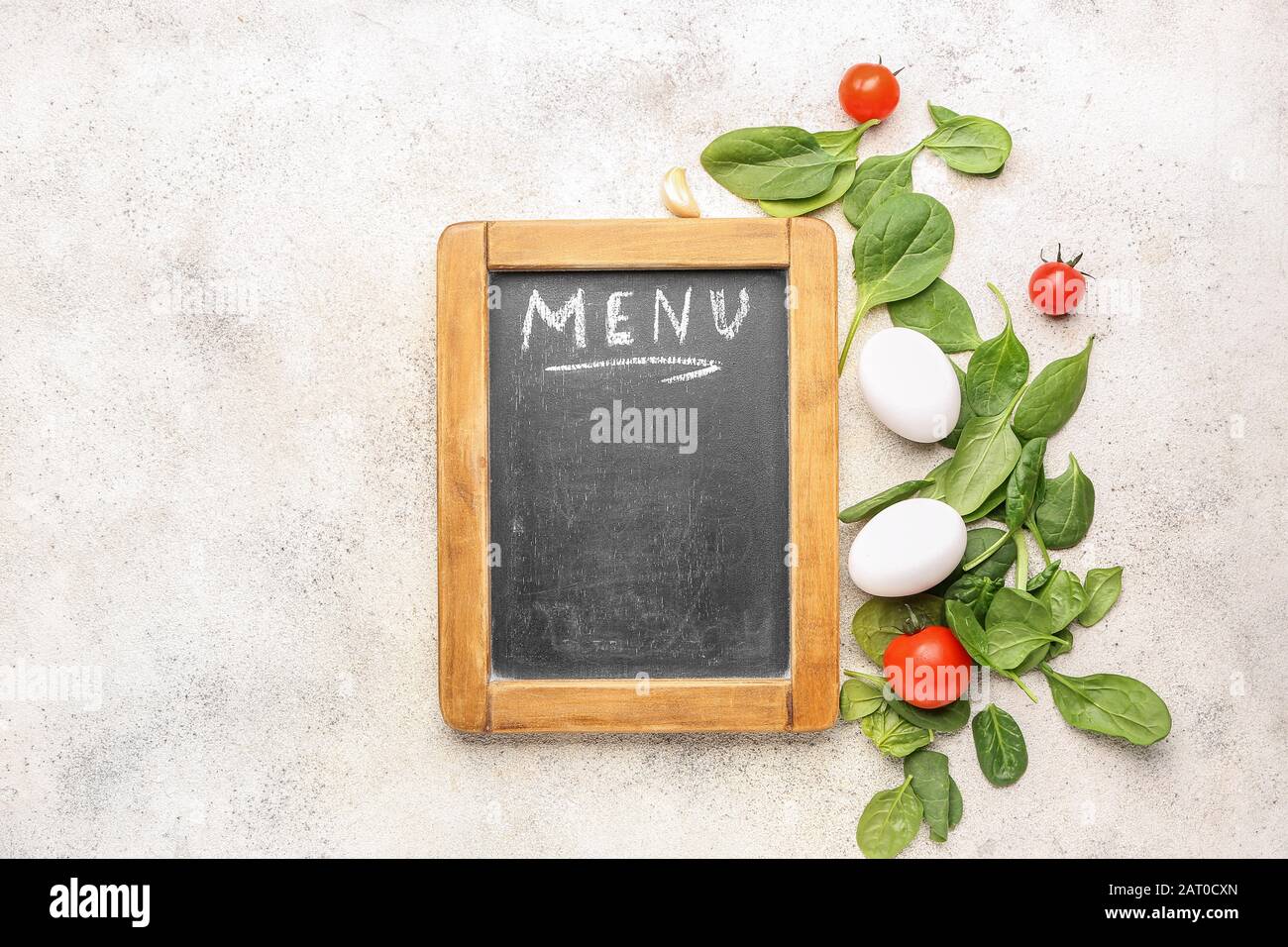 Blank menu and products on light background Stock Photo - Alamy