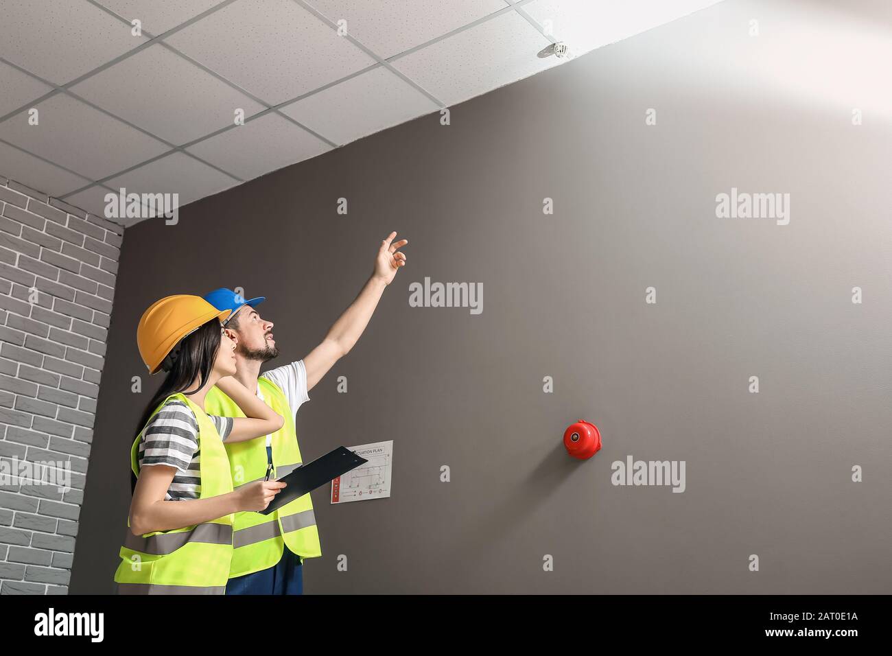 Fire safety specialists inspecting building Stock Photo Alamy