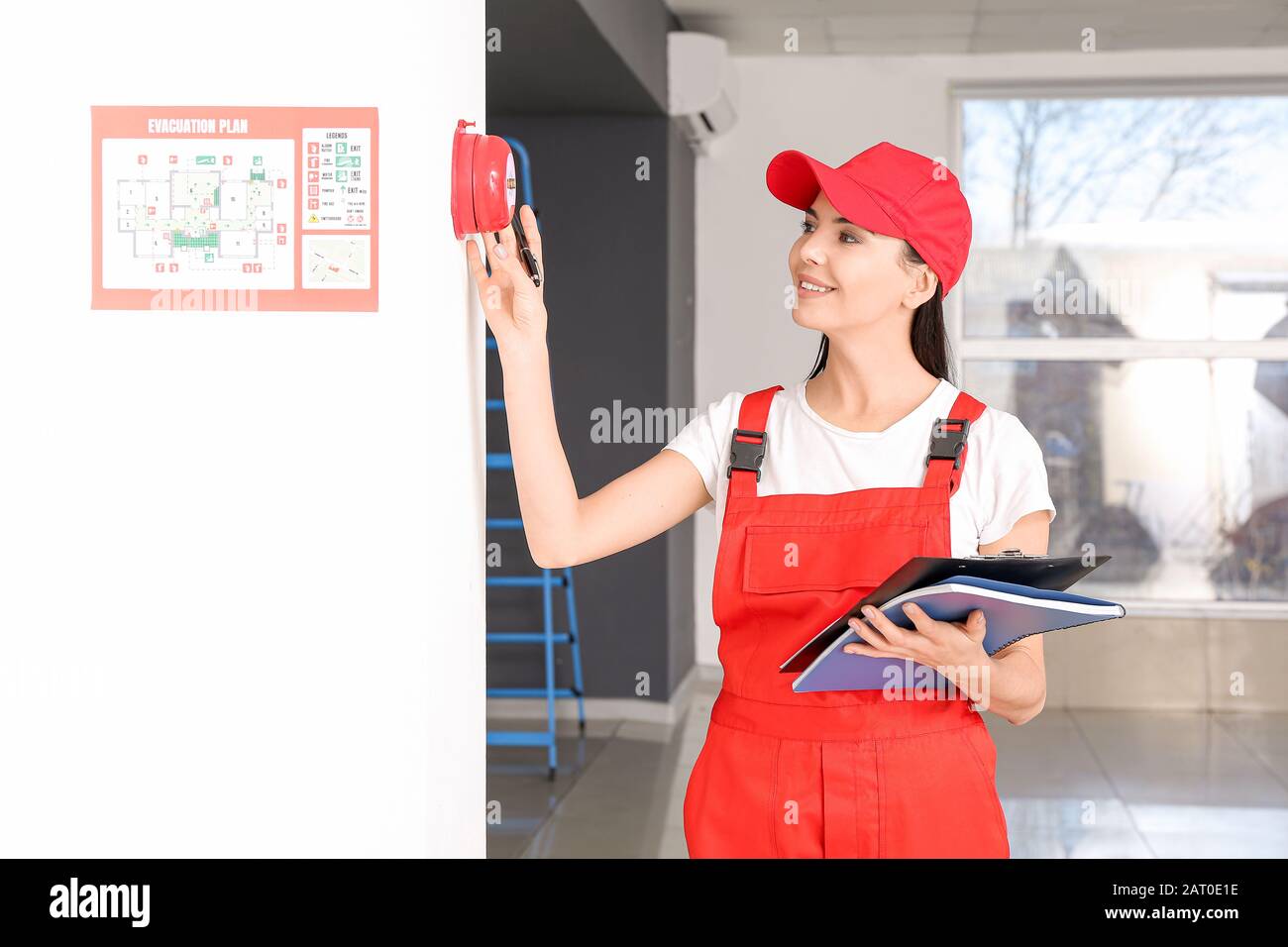 Fire safety specialist inspecting building Stock Photo Alamy