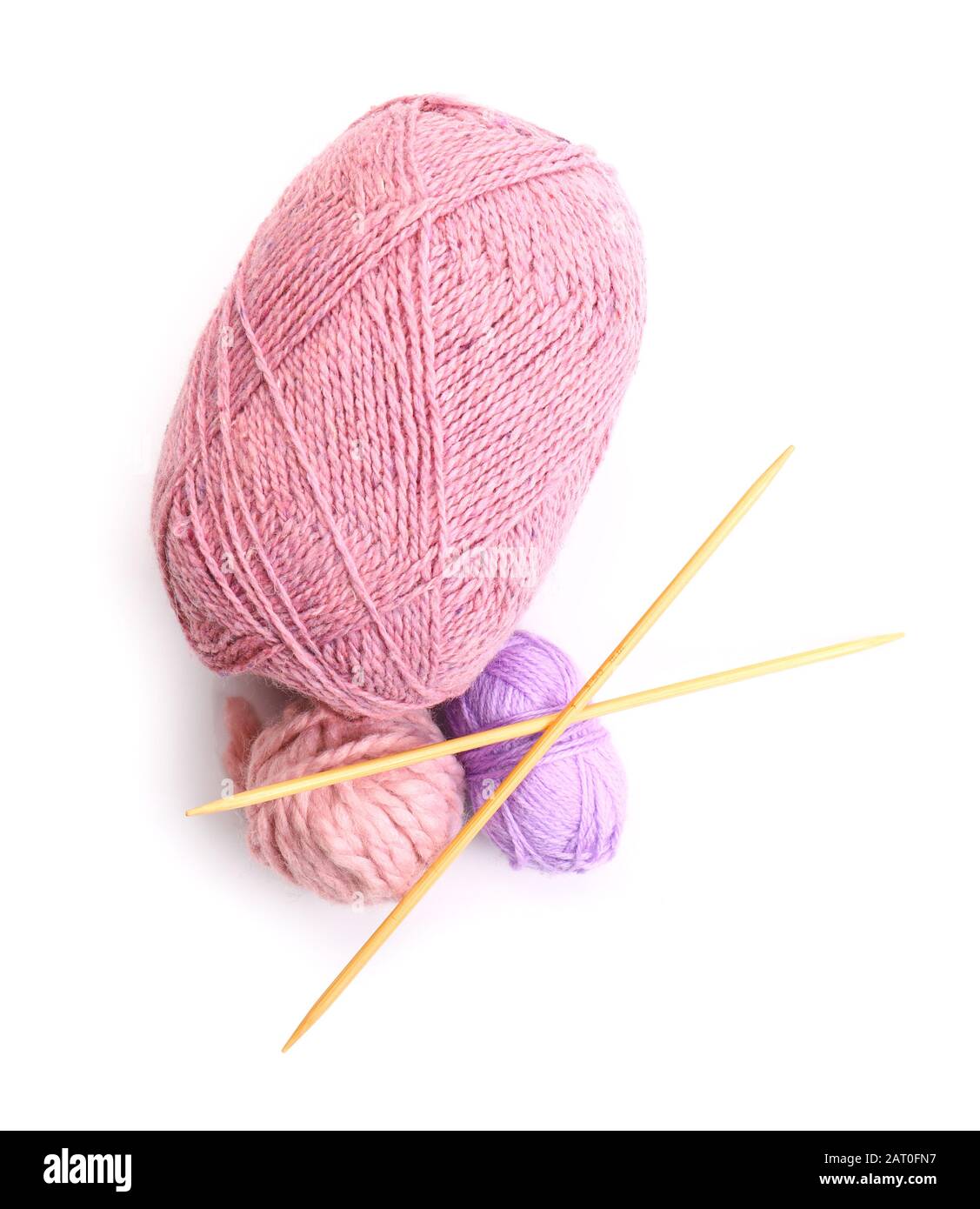 Knitting yarns and needles on white background Stock Photo - Alamy